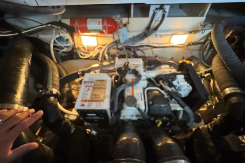  Yacht Photos Pics Engine room of a 2008 Sea Ray 330 Sundancer with visible wiring and components.