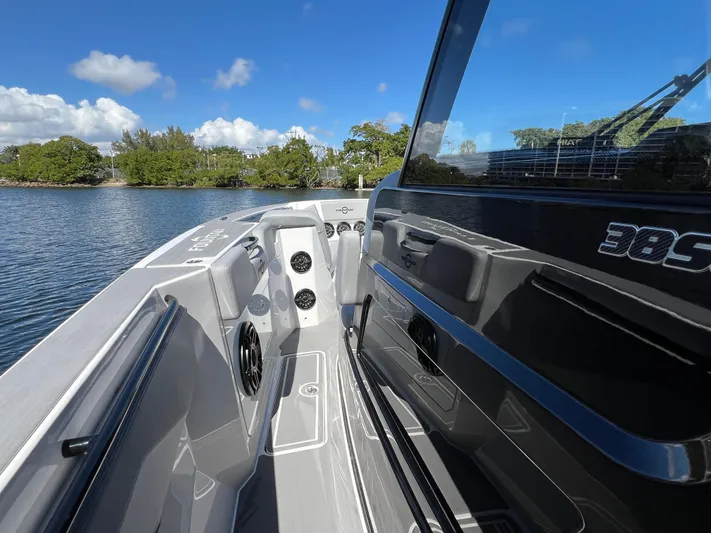  Yacht Photos Pics 2023 Fountain 38 SCX boat interior with sleek design on a sunny day.