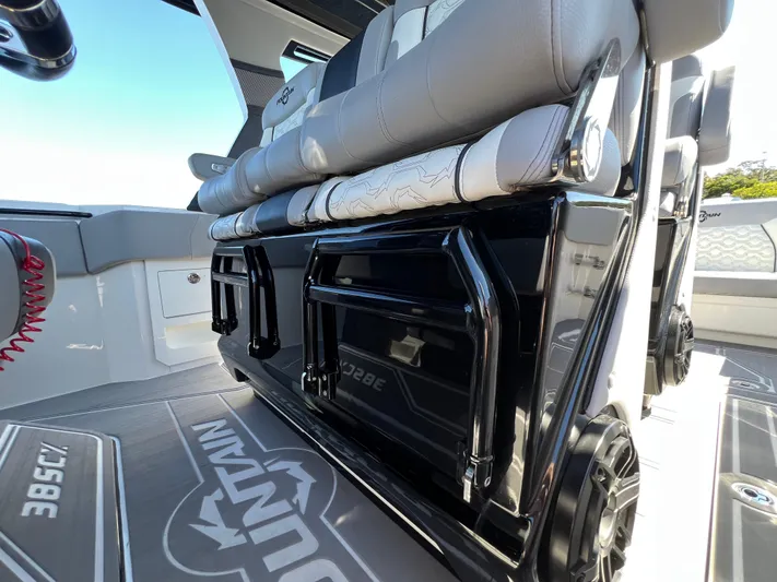  Yacht Photos Pics 2023 Fountain 38 SCX boat interior with sleek seating and modern design.
