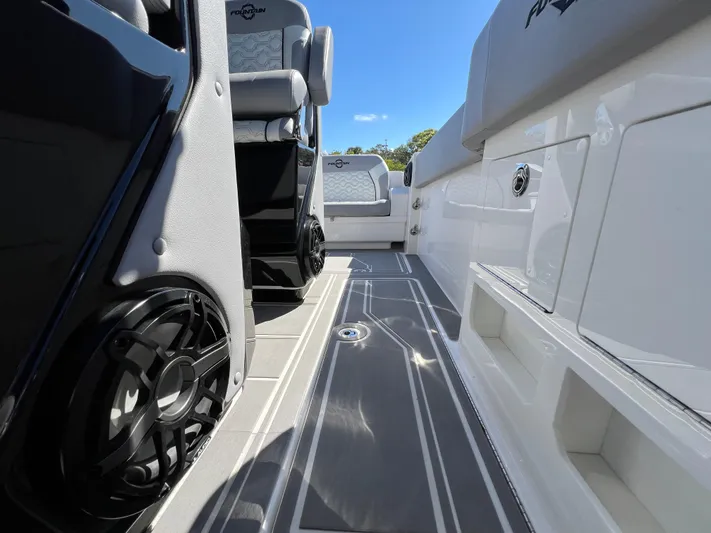  Yacht Photos Pics 2023 Fountain 38 SCX boat interior with sleek seating and modern design.