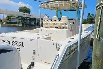  Yacht Photos Pics 2022 Grady-White Canyon 336 boat docked by the water.