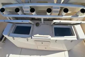  Yacht Photos Pics 2022 Grady-White Canyon 336 fishing station with rod holders and storage compartments.