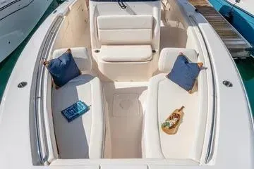  Yacht Photos Pics 2022 Grady-White Canyon 336 boat interior with seating, cushions, and decorative items.