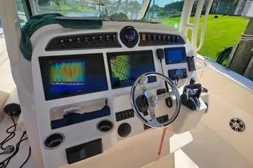  Yacht Photos Pics 2022 Grady-White Canyon 336 boat dashboard with advanced navigation and control systems.