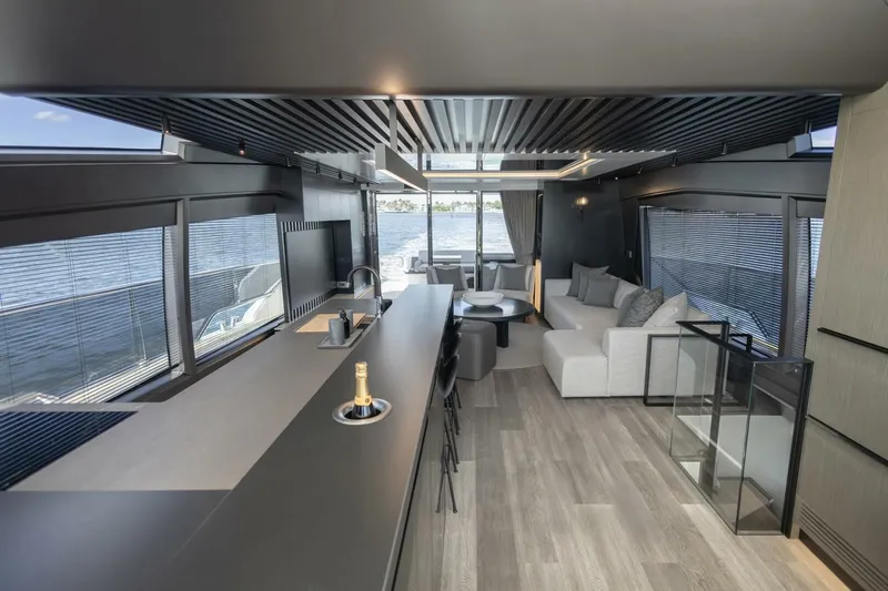 Pearl 72 Indulgence Yacht Photos Pics Luxurious interior of 2025 Pearl 72 yacht with modern design and waterfront view.