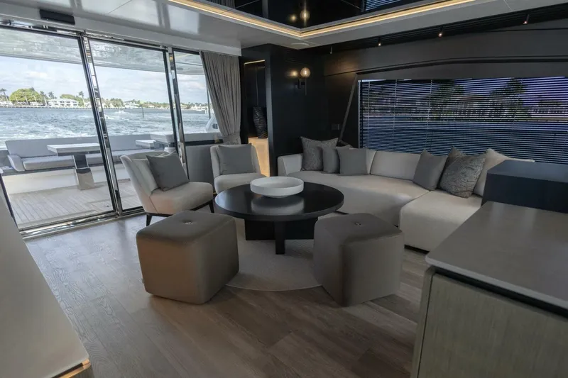 Pearl 72 Indulgence Yacht Photos Pics Luxurious interior of 2025 Pearl 72 yacht with modern seating and ocean view.
