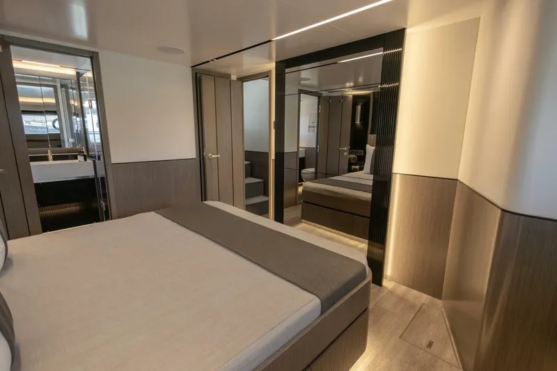 Pearl 72 Indulgence Yacht Photos Pics Luxurious interior of 2025 Pearl 72 yacht, featuring modern bedroom design and elegant finishes.