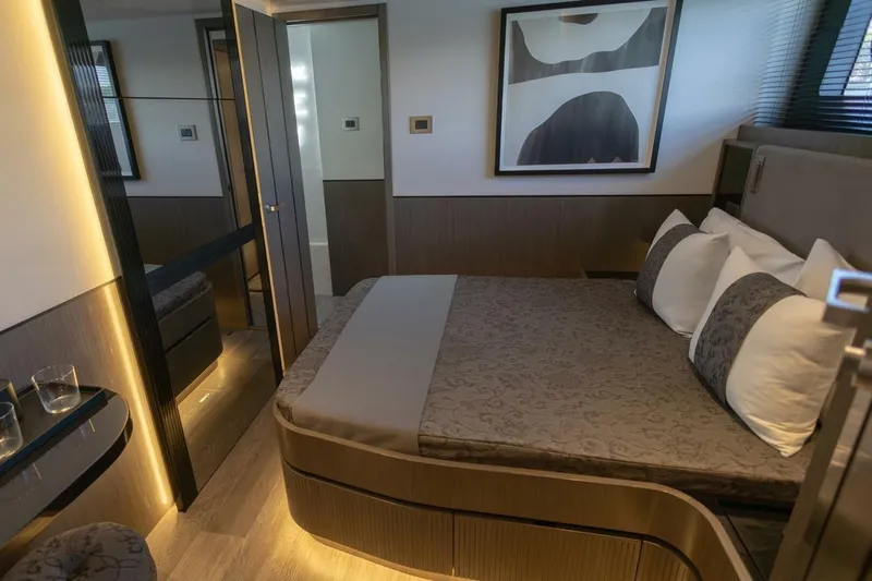 Pearl 72 Indulgence Yacht Photos Pics Luxurious bedroom interior in 2025 Pearl 72 yacht, featuring modern design and elegant decor.