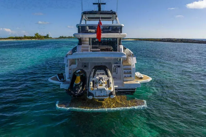 Pearl 72 Indulgence Yacht Photos Pics Luxury Pearl 72 yacht, 2025 model, anchored in clear turquoise waters.