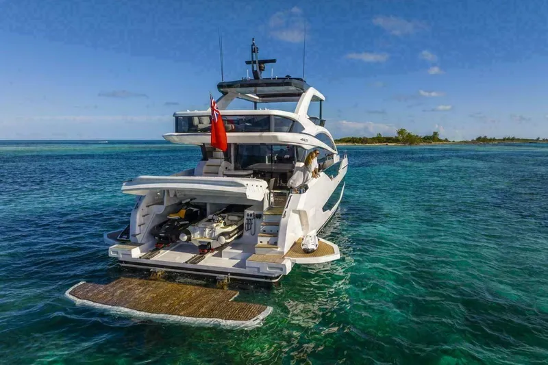 Pearl 72 Indulgence Yacht Photos Pics Luxury Pearl 72 yacht cruising in clear blue waters, 2025 model.