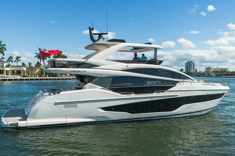 Pearl 72 Indulgence Yacht Photos Pics Luxurious 2025 Pearl 72 yacht cruising on a sunny day, featuring sleek design and modern amenities.