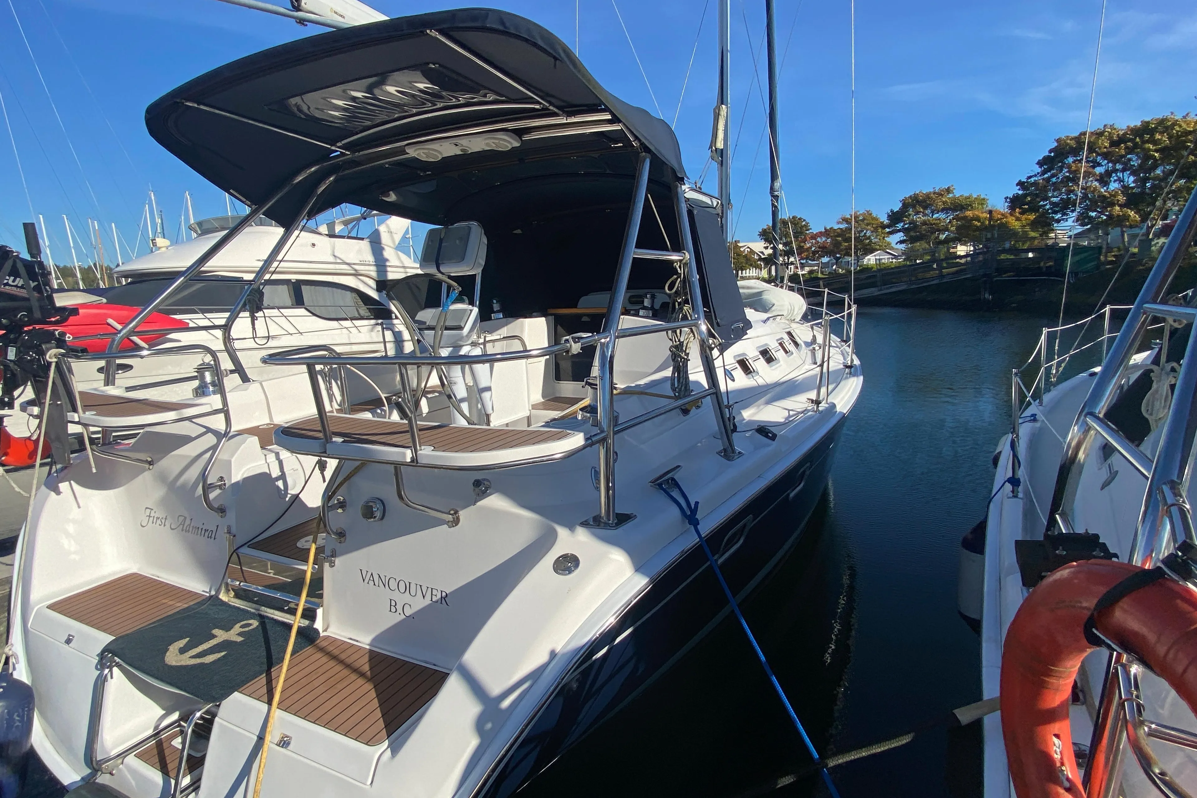 2006 Hunter 38 sailboat docked in marina.