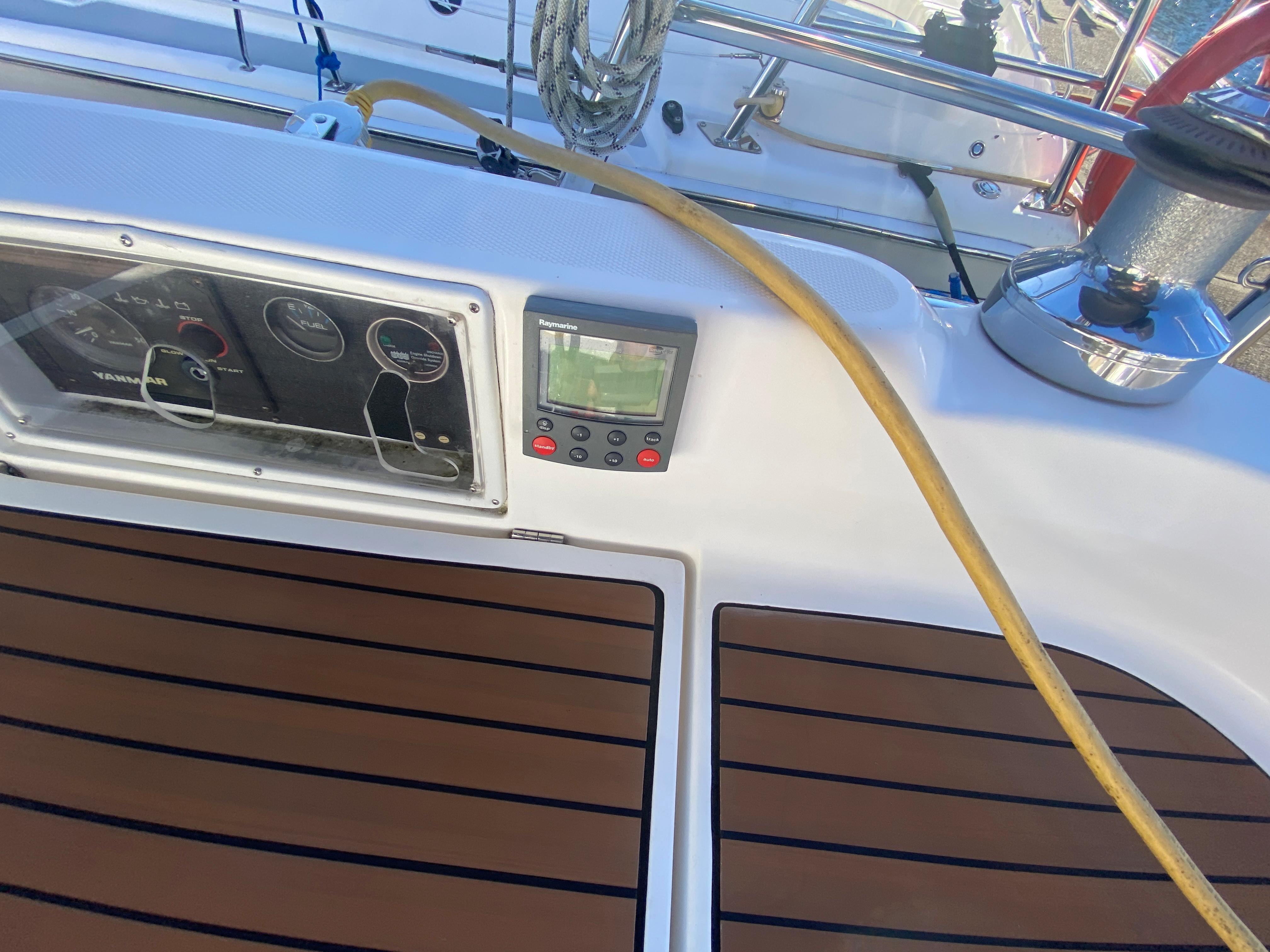 Cockpit of a 2006 Hunter 38 sailboat with instrument panel.