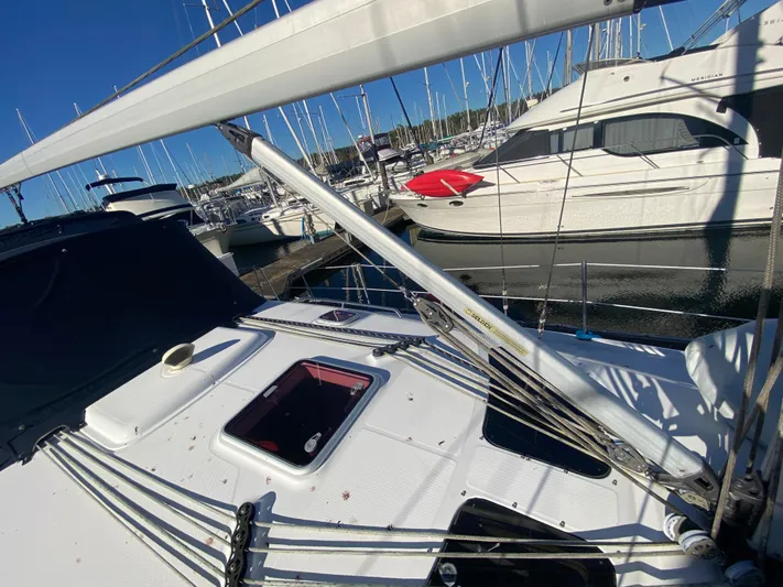 First Admiral Yacht Photos Pics Deck of a 2006 Hunter 38 sailboat in the marina.