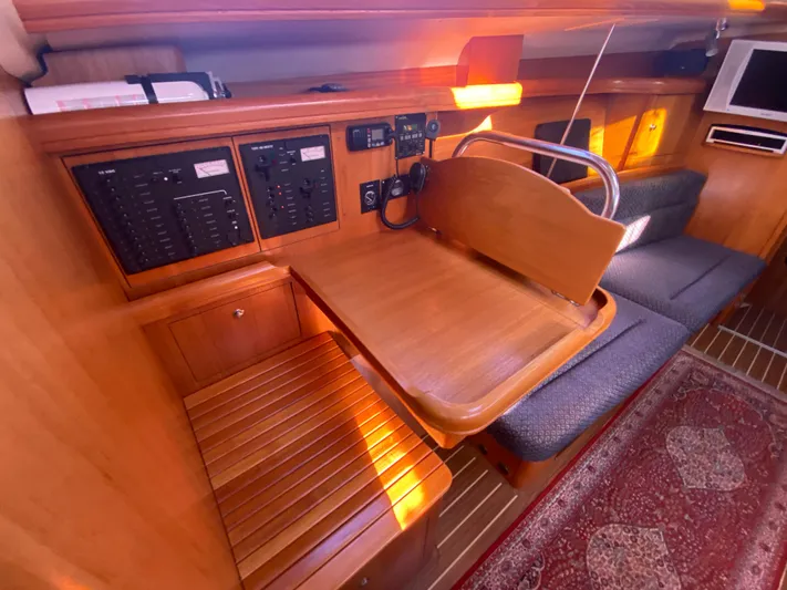 First Admiral Yacht Photos Pics Interior of a 2006 Hunter 38 yacht with wooden furnishings.