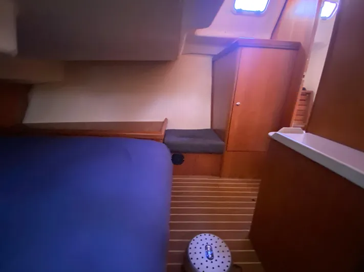 First Admiral Yacht Photos Pics Interior of a 2006 Hunter 38 yacht with wooden furnishings.