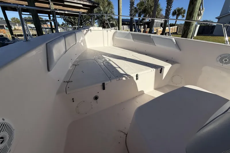 Hooked On A Feeling Yacht Photos Pics 2005 Grady-White Bimini 306 boat interior with seating and storage compartments.