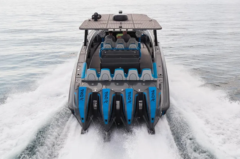  Yacht Photos Pics 2020 Midnight Express 43' Open boat with four powerful 450R engines cruising on water.