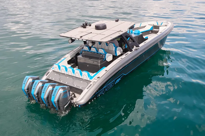  Yacht Photos Pics 2020 Midnight Express 43' Open boat with quad engines on clear water.