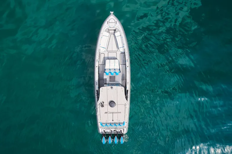  Yacht Photos Pics Aerial view of 2020 Midnight Express 43' Open boat on clear blue water.