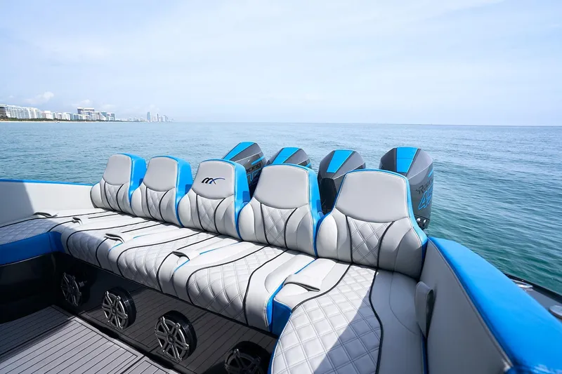  Yacht Photos Pics 2020 Midnight Express 43' Open boat with luxurious seating and powerful engines on open water.