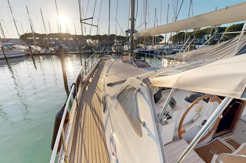  Yacht Photos Pics Sailing yacht Amel Super Maramu 2000, 2002 model, docked at marina during sunset.