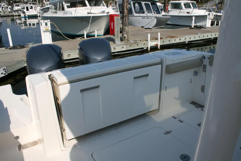  Yacht Photos Pics 2018 Pursuit S 328 Sport boat docked with dual engines.