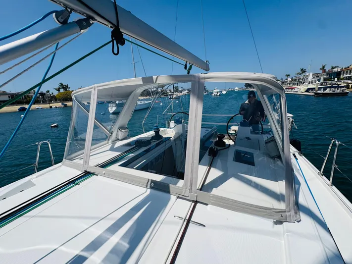 Happy Hour Yacht Photos Pics Beneteau Oceanis 41.1 sailboat, 2020 model, cruising in a sunny marina.