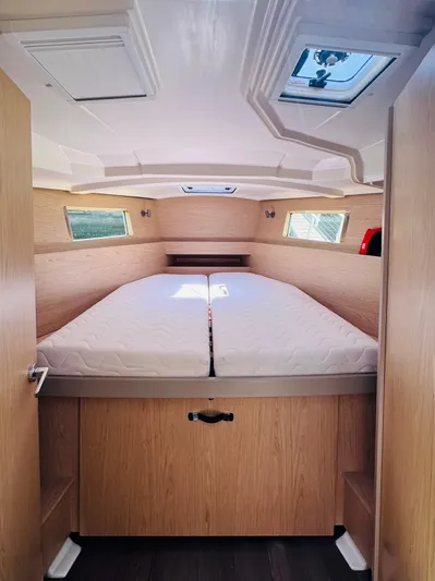 Happy Hour Yacht Photos Pics 2020 Beneteau Oceanis 41.1 cabin interior with double bed and natural wood finish.