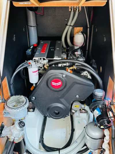 Happy Hour Yacht Photos Pics Engine room of 2020 Beneteau Oceanis 41.1 sailboat, featuring Yanmar engine components.