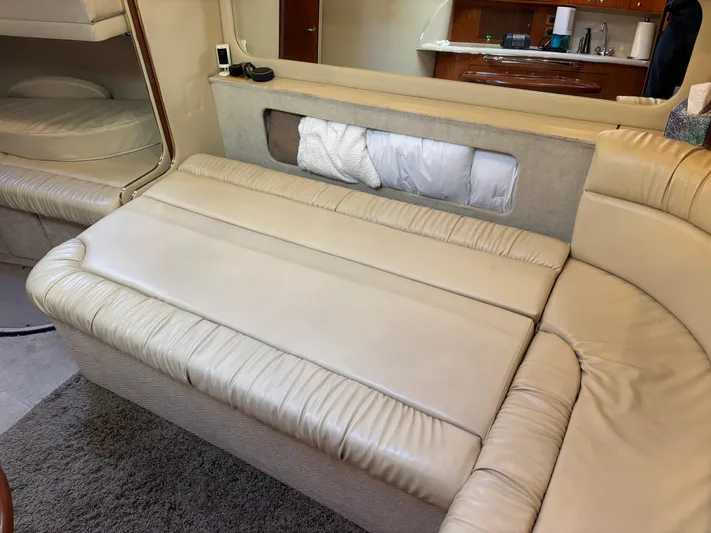 Dragon Fly Yacht Photos Pics Settee in Salon converts to berth with push of a button