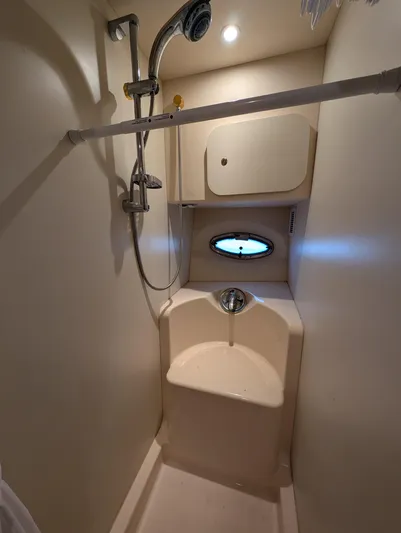  Yacht Photos Pics 2005 Silverton 34 Convertible shower with modern fixtures and compact design.