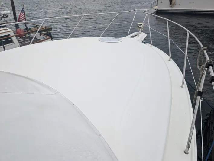  Yacht Photos Pics 2005 Silverton 34 Convertible yacht deck view at marina.