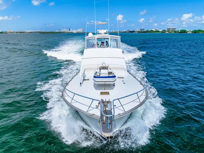Bahama Belle Yacht Photos Pics 1996 Blackwell 72 yacht cruising on blue ocean waters under clear sky