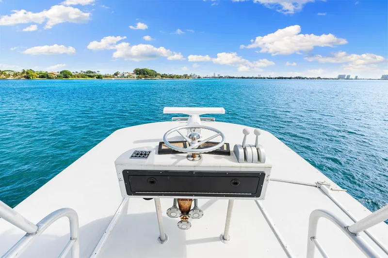 Bahama Belle Yacht Photos Pics View from the helm of a 1996 Blackwell 72 boat on a sunny day.