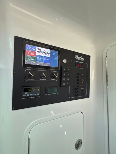  Yacht Photos Pics Control panel of 2026 Mag Bay 38 CC boat with digital displays and switches.