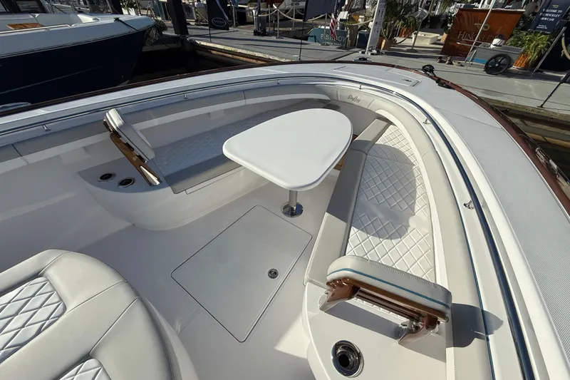  Yacht Photos Pics Luxurious seating area on 2026 Mag Bay 38 CC boat with elegant white upholstery.