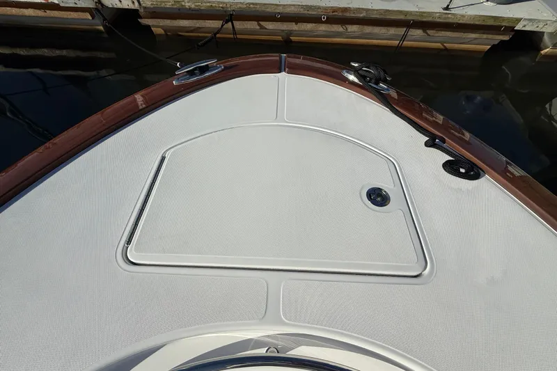  Yacht Photos Pics Bow deck of 2026 Mag Bay 38 CC boat, featuring sleek design and storage hatch.