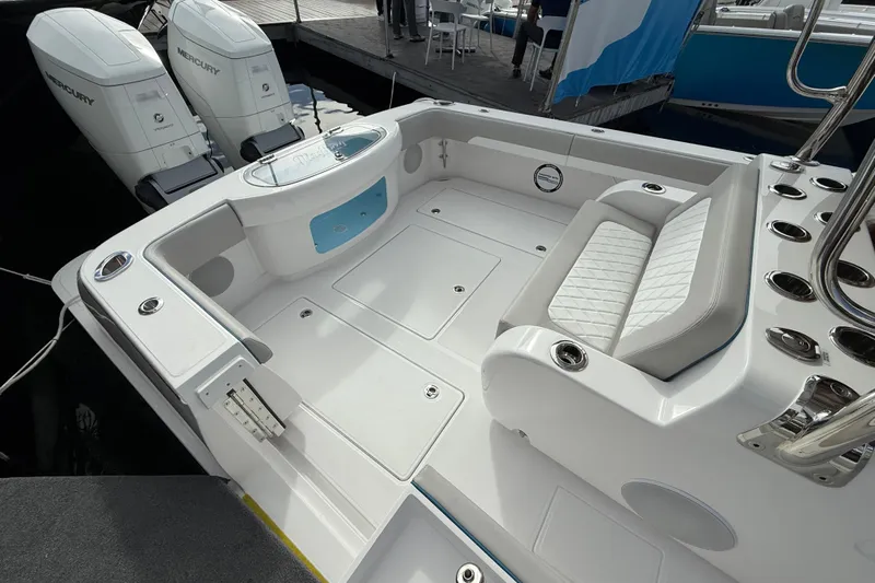  Yacht Photos Pics 2026 Mag Bay 38 CC boat deck with seating and twin Mercury engines.