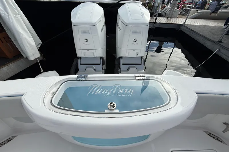  Yacht Photos Pics 2026 Mag Bay 38 CC boat with dual Mercury Verado engines at dock.