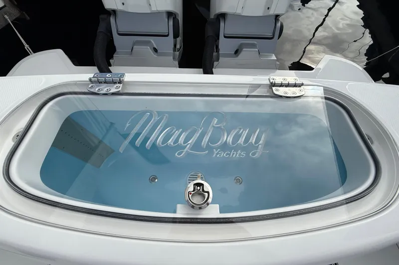  Yacht Photos Pics 2026 Mag Bay 38 CC yacht livewell with logo, featuring sleek design and modern fittings.