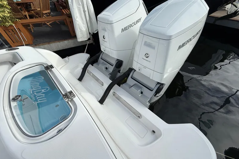 Yacht Photos Pics 2026 Mag Bay 38 CC boat with dual Mercury Verado engines docked.