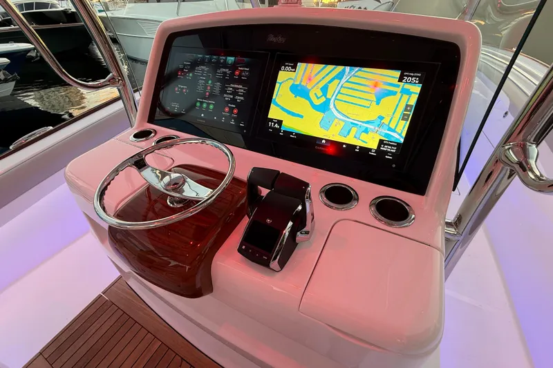  Yacht Photos Pics 2026 Mag Bay 38 CC helm with advanced navigation display and controls.