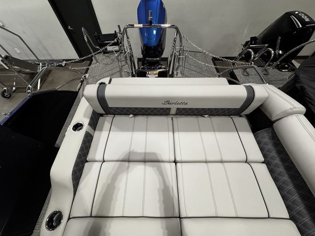 2025 Barletta Boats R23UCA interior with luxurious white seating and modern design.