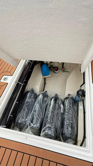  Yacht Photos Pics Storage compartment of 2026 Ranger Tugs R-27 boat with equipment and accessories.