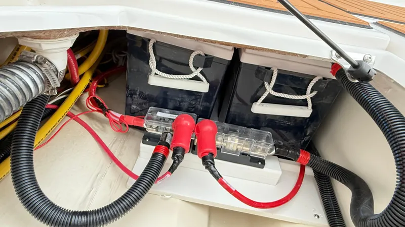  Yacht Photos Pics Battery compartment of 2026 Ranger Tugs R-27 with cables and connectors.