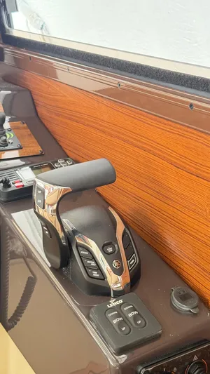  Yacht Photos Pics Control panel of 2026 Ranger Tugs R-27 with throttle and trim controls.