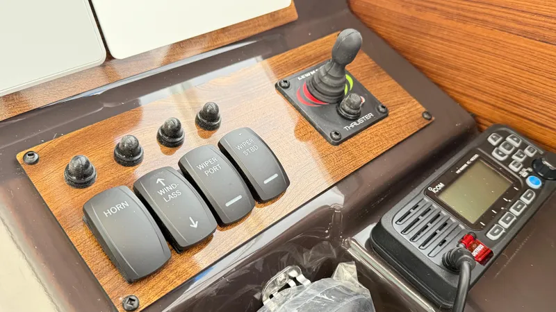  Yacht Photos Pics Control panel of 2026 Ranger Tugs R-27 with switches and joystick.