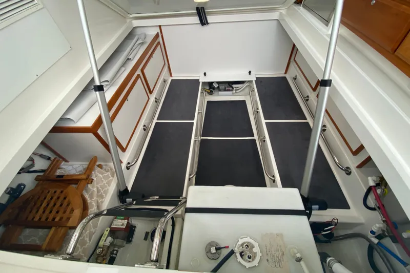 Laure Marie Yacht Photos Pics 2020 Back Cove 34O boat interior with storage compartments and equipment.