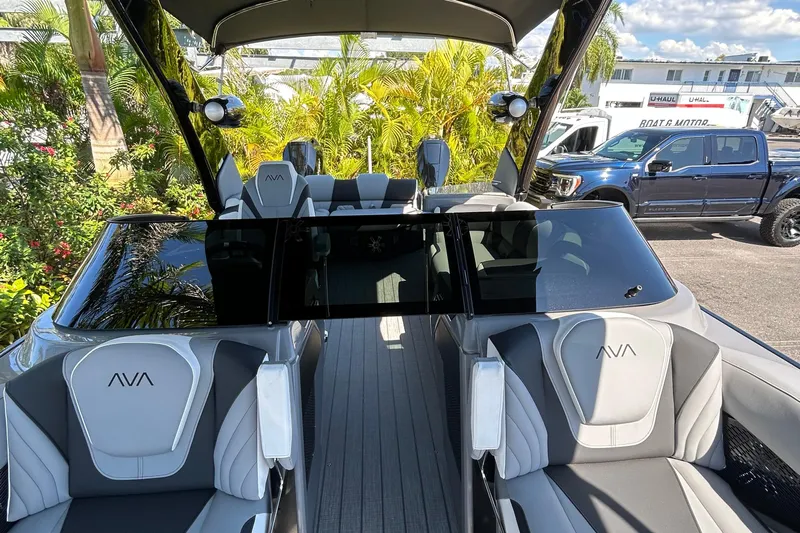  Yacht Photos Pics 2026 Avalon Excalibur 27 Foot boat interior with modern seating and sleek design.